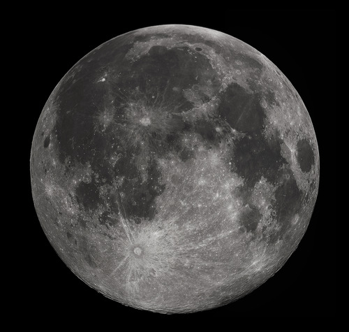 A photo of the full moon, large enough to see the various craters.