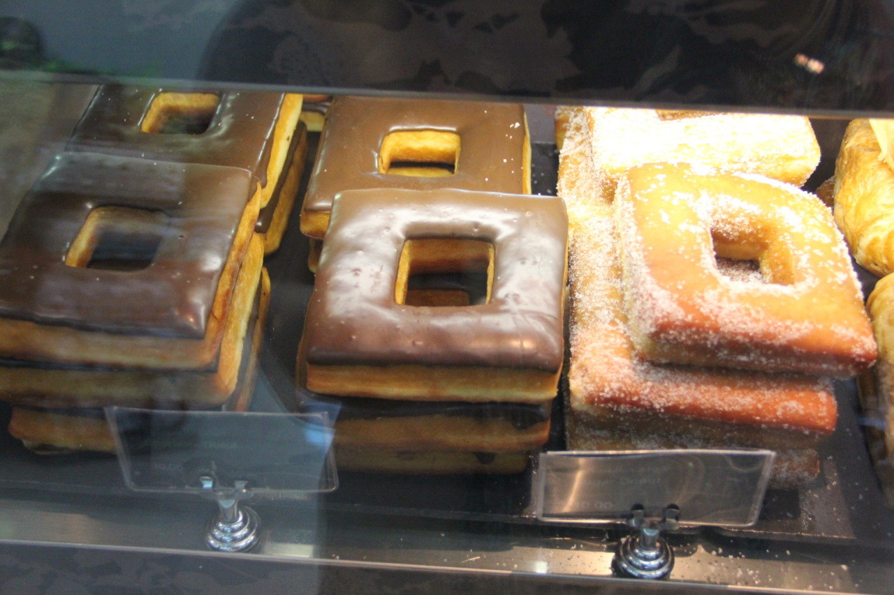 Photo of 'square' donuts. They have a square outline, and a square hole in the middle, and the cross-section of each side is square.