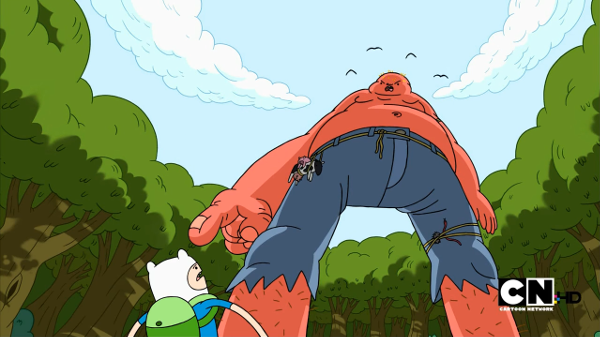Finn faces a giant red ogre, which points at him with a petulant expression. The scene is shot from below to emphasise the Ogre's size.