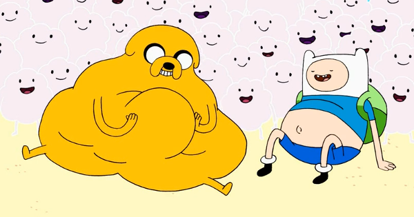 Jake and Finn slumped on the ground with swollen bellies. Jake is holding his with a fond expression. Behind them are a bunch of like, fluff people or something.