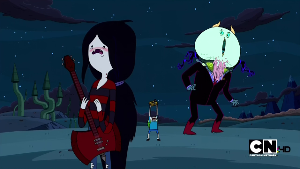 Hunson Aberdeer, a huge monstrous figure in a suit, with a bulbous head and a vertical slit mouth, turns around with a chagrined expression. In the foreground, Marceline is blushing, mortified; in the background, Finn is barely visible holding up a tape recorder.