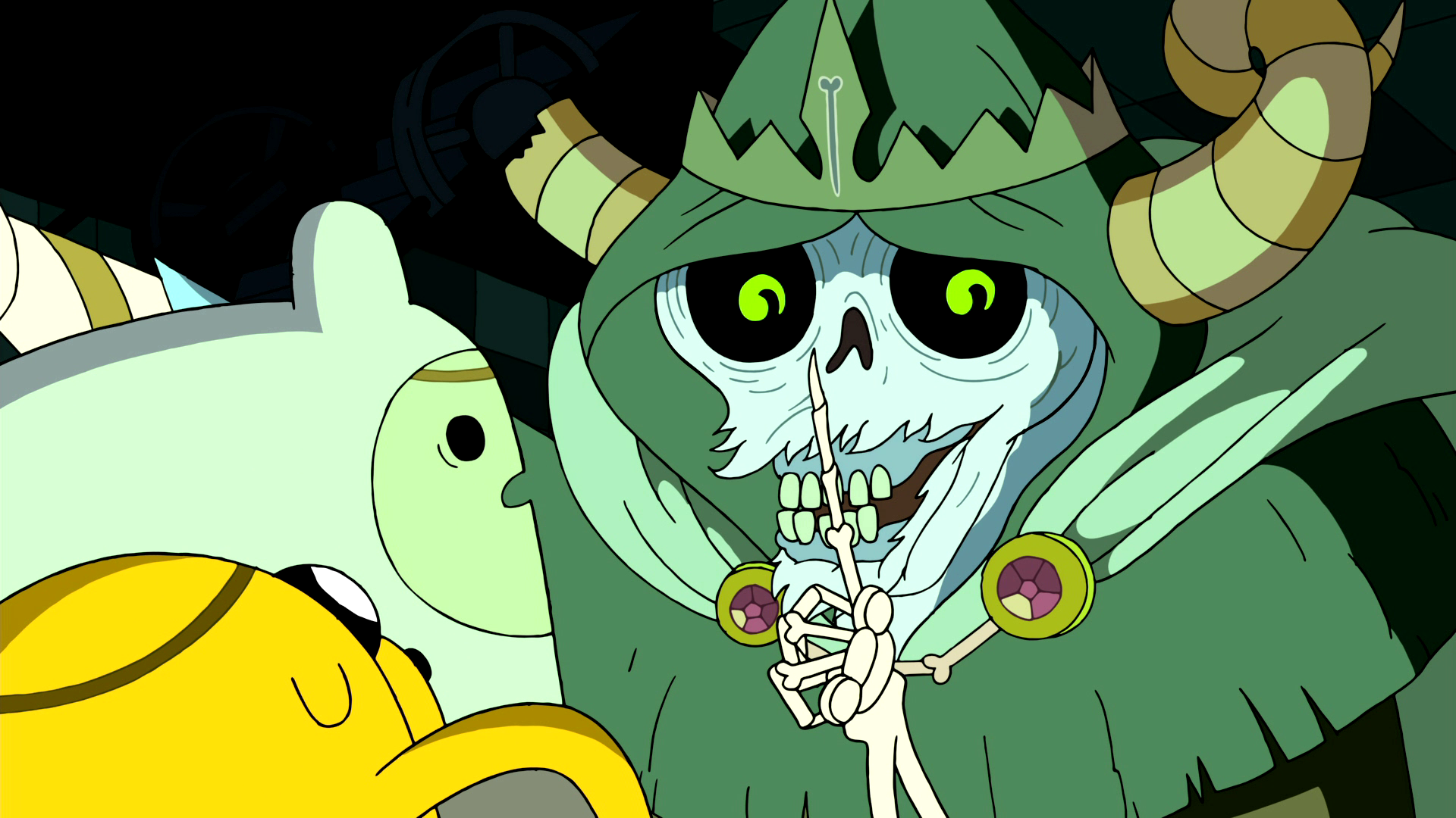 The Lich holds a scowling Finn up, shushing him. His head resembles a cow with the flesh missing from the front of the jaw.