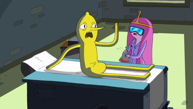 Princess Bubblegum stands over a slab with a naked Earl of Lemongrab. Lemongrab is a yellow man with a lemon-shaped head and a long pointy nose. He is waving his arms and screaming.
