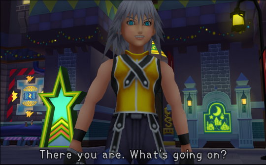 Sora's friend Riku, a boy with grey spiky hair (it's a theme) and a yellow waistcaot with some unlikely belts. His arms are bare except for bracers.