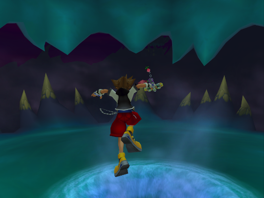 Sora leaping into a large blue portal surrounded by spiky stalagmites.